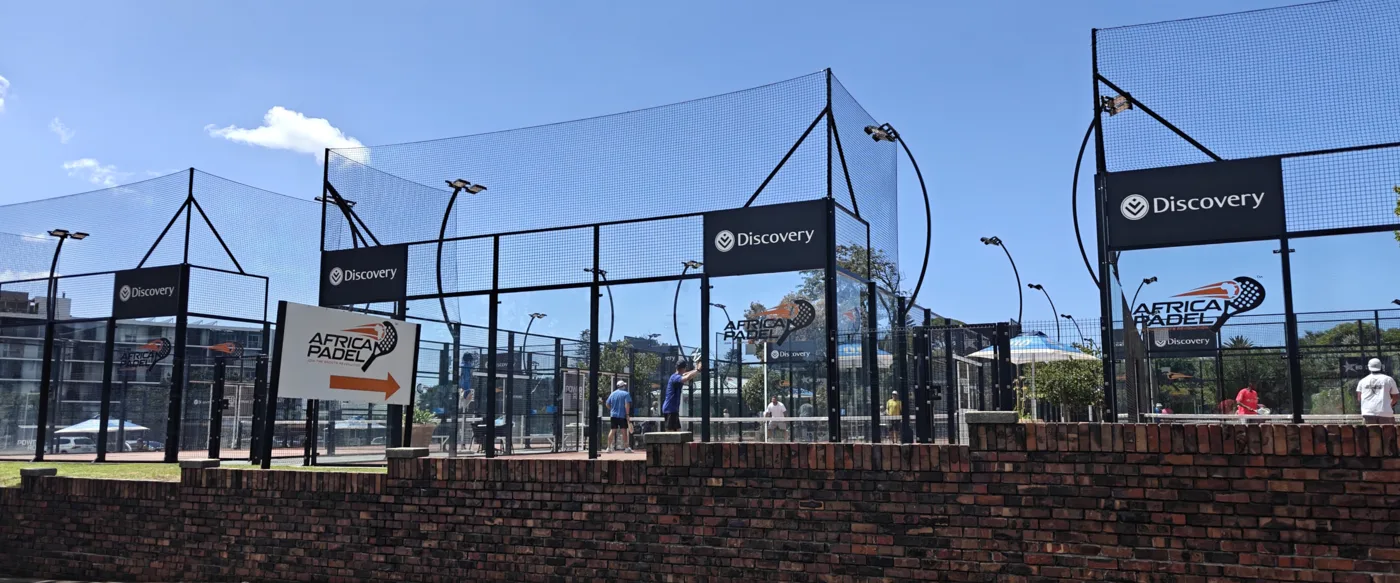A padel court: glass walls, a smaller pitch than tennis and an underarm serve. This is not the Grove Park club