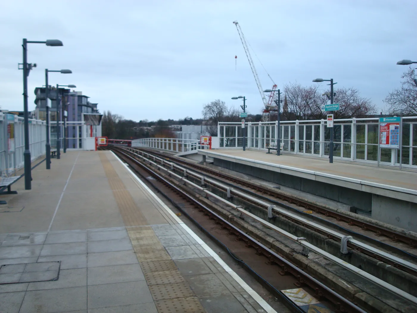 Deptford Bridge DLR station. The former Lewisham College site sits directly alongside the elevated platforms