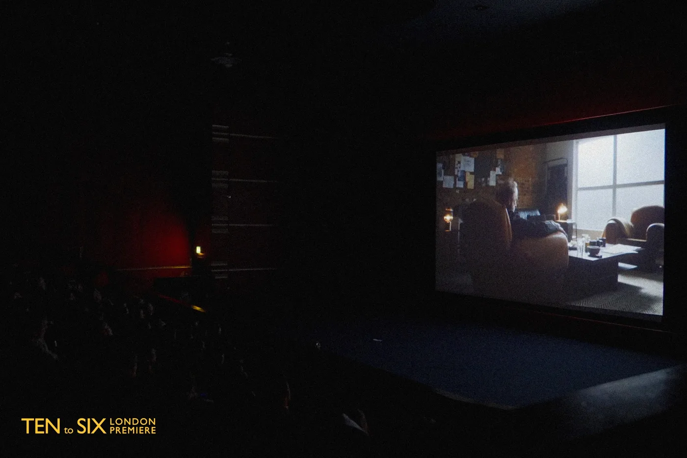 A darkened cinema with a scene from Ten to Six on the screen