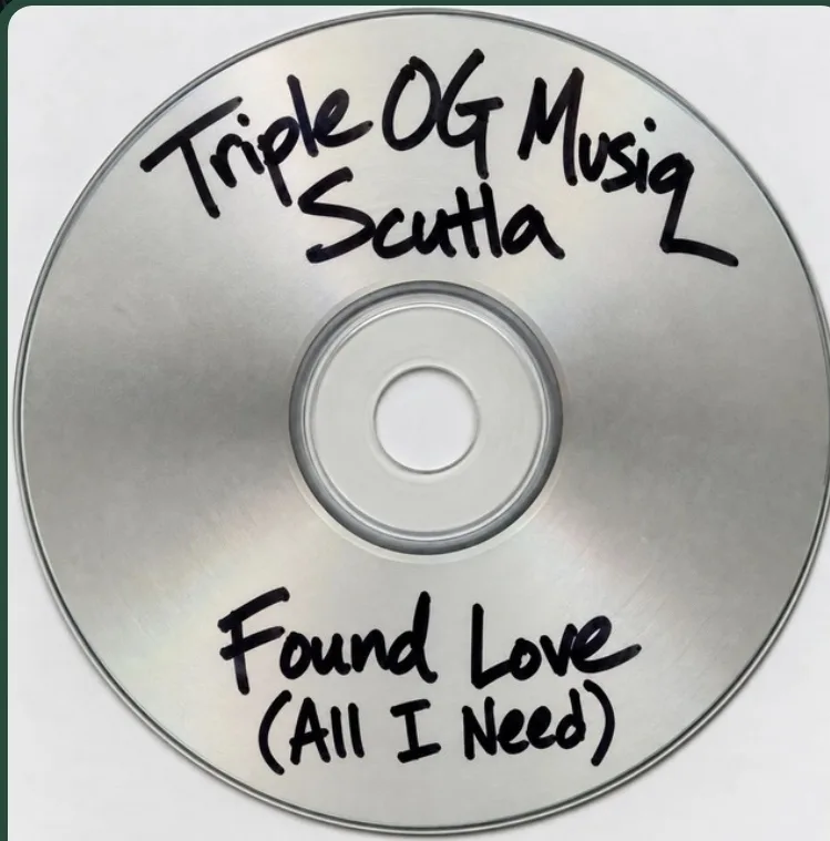 Silver compact disc handwritten in black marker with Triple OG Musiq, Scutla, Found Love (All I Need)